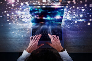 laptop with software icons