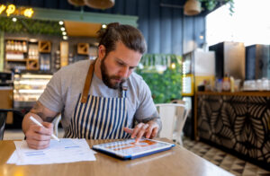 Business owner doing cashflow forecast